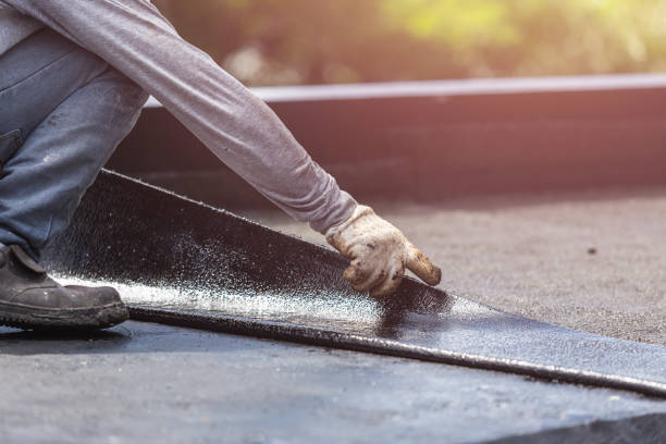 Professional Exterior Waterproofing technician working in Lakeville, MN